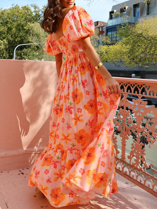 Maxi robe à manches bouffantes avec motif floral et dos élastiqué