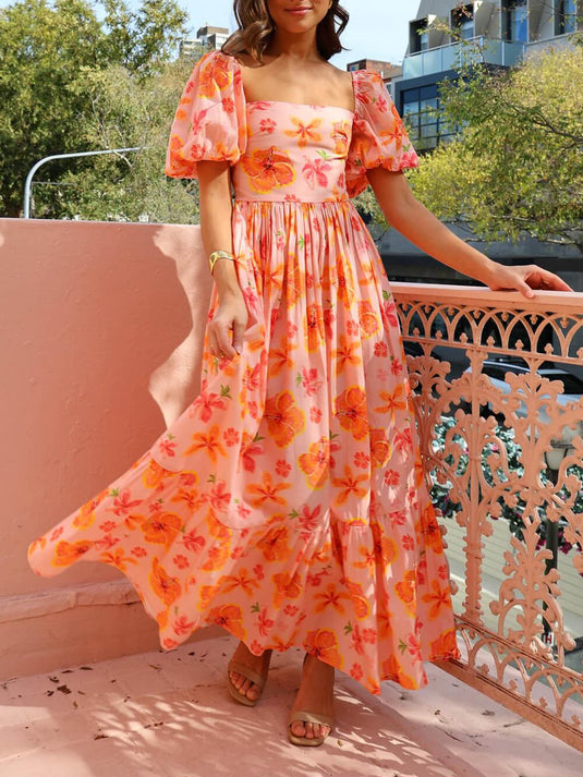 Maxi robe à manches bouffantes avec motif floral et dos élastiqué