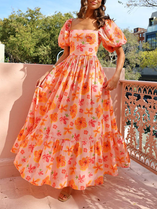 Maxi robe à manches bouffantes avec motif floral et dos élastiqué